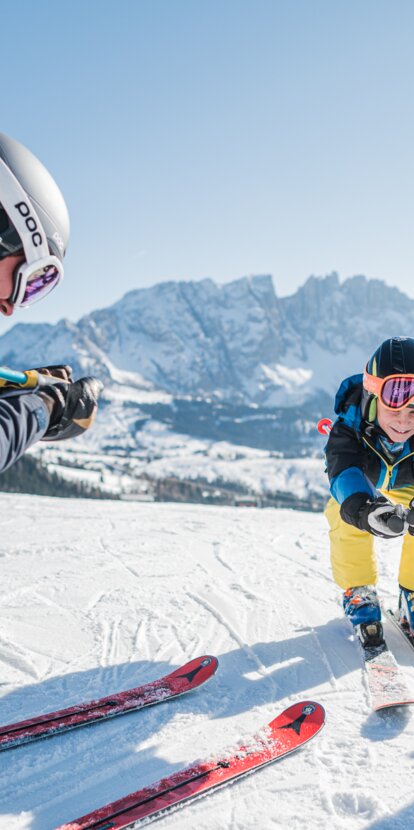Area sciistica familiare Carezza Dolomites | © Carezza Dolomites/Harald Wisthaler Sciare con i bambini a Carezza | © Carezza Dolomites/Harald Wisthaler