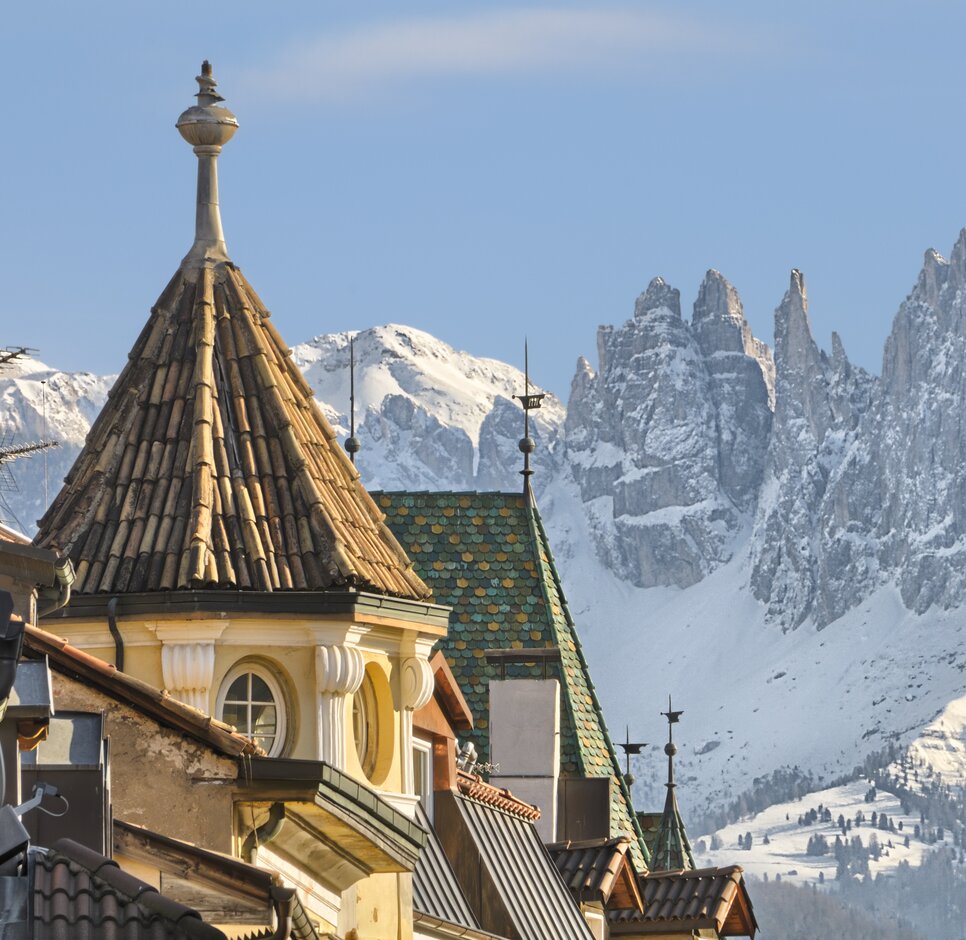 Bozen Winter | © Sergio Buono Dächer Bozen Rosengarten Vajolet Türme Winter | © Sergio Buono